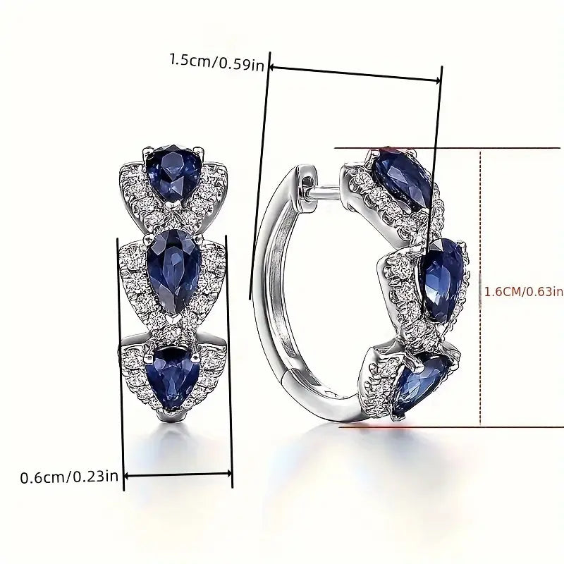Kunglig Safir Crest Örhängen | Vitguld