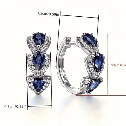 Kunglig Safir Crest Örhängen | Vitguld